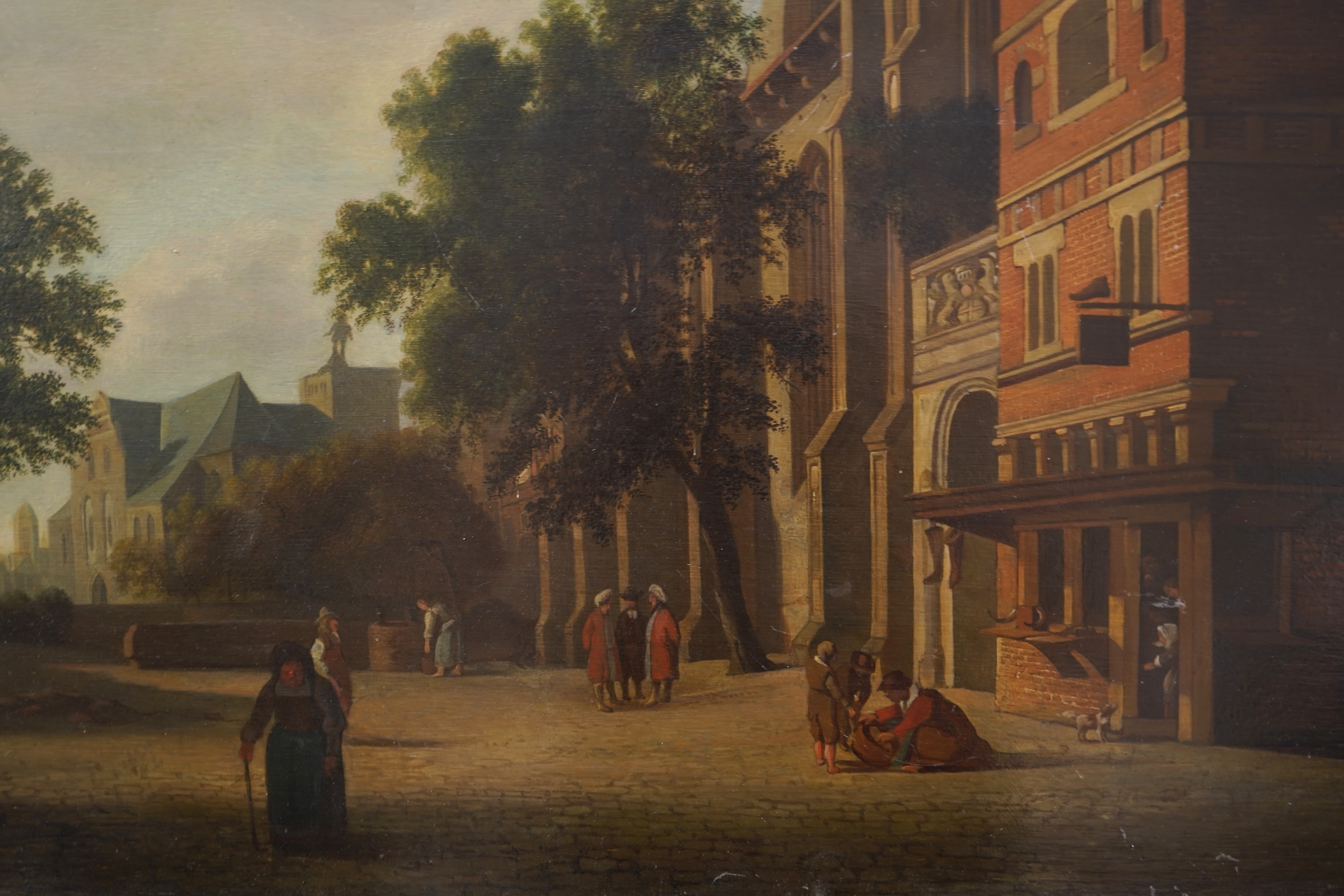 After Jan Van Der Heyden, Dutch (1637-1712), 'Square with a Cobbler's Shop and a Gothic Church'